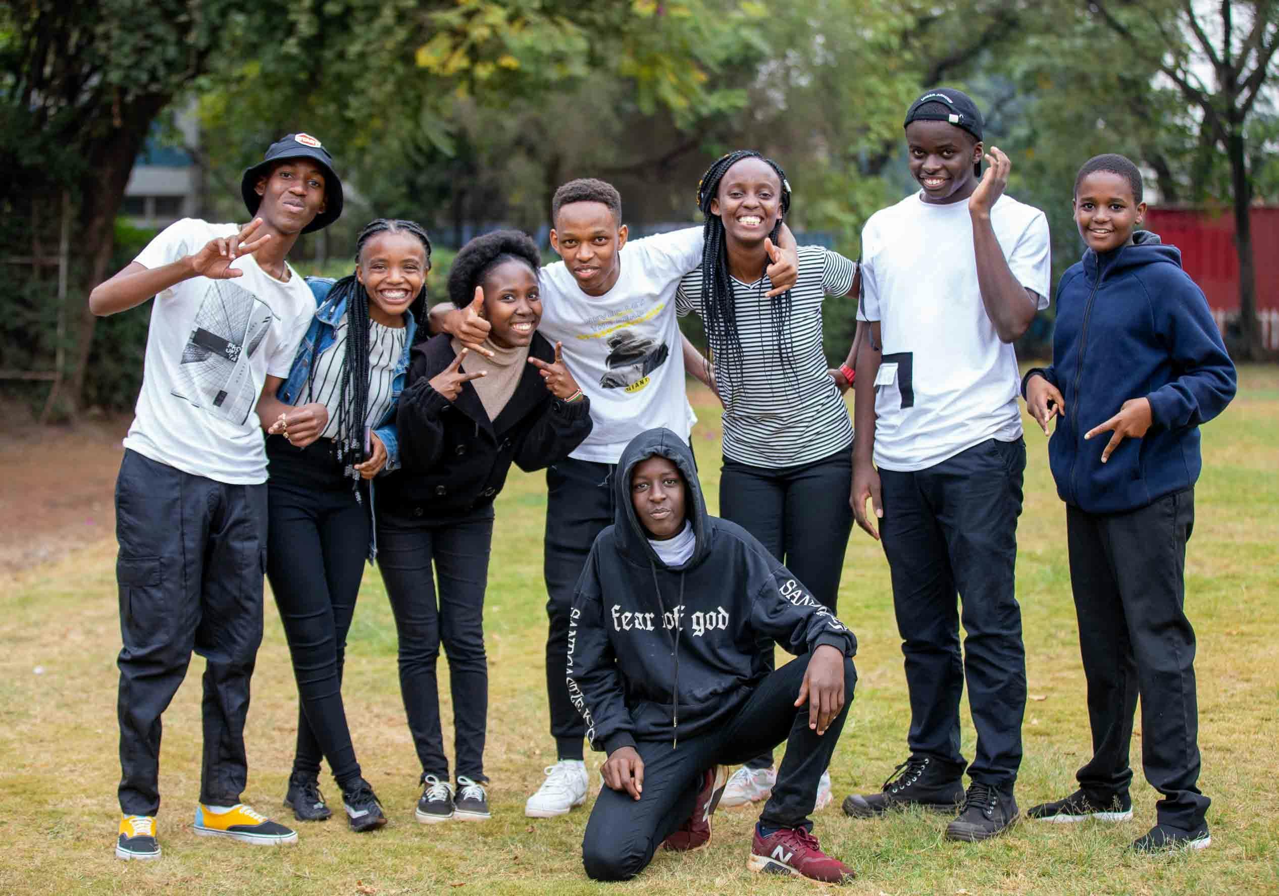 A group of young South Africans smiling together outdoors